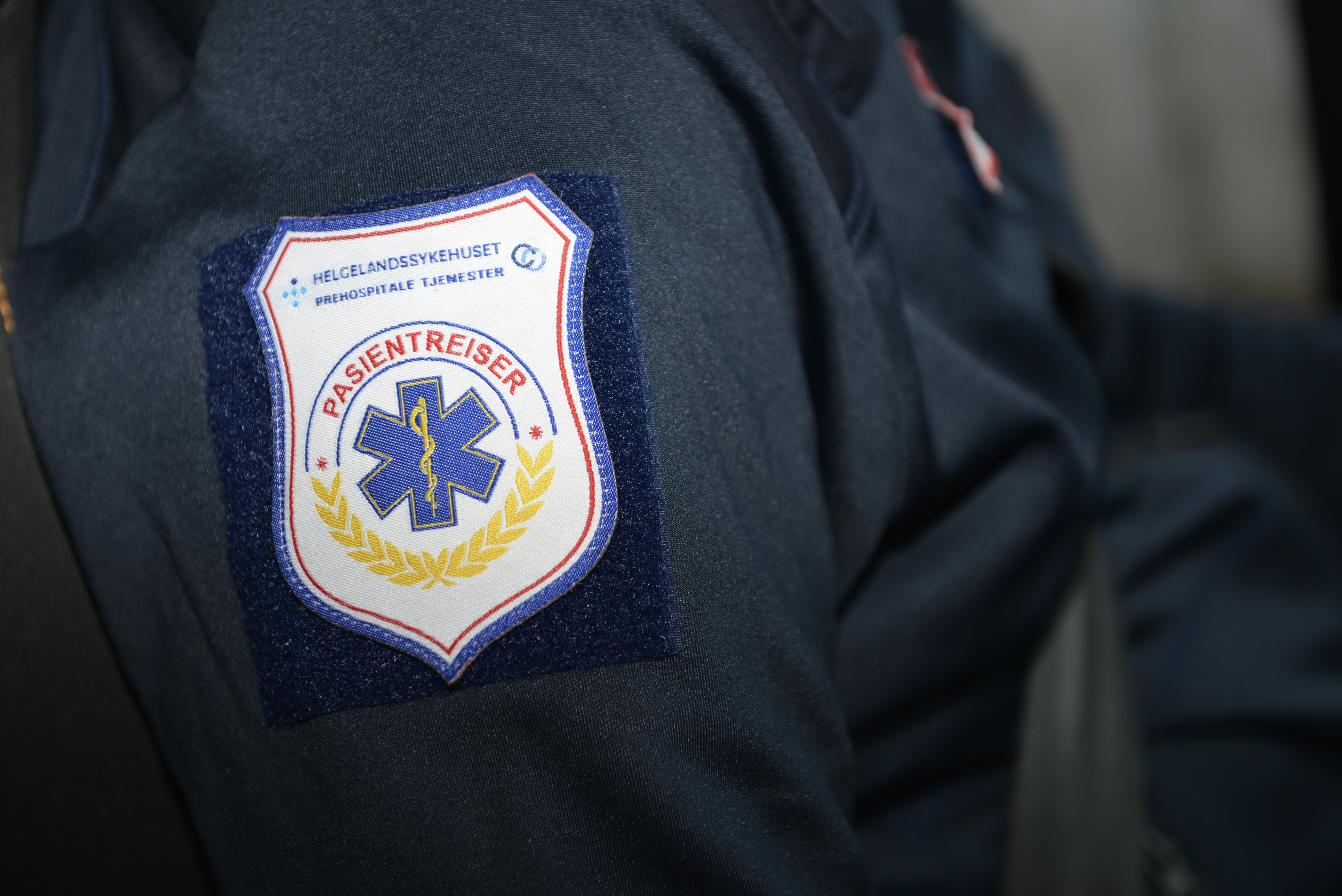 Nærbilde av en kleslapp med påskriften "Pasientreiser"